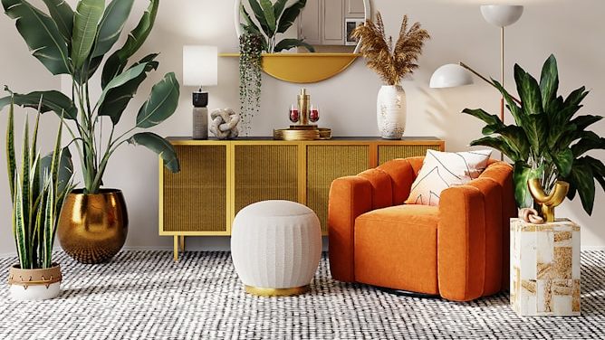 A living room with warm white walls, a mustard sideboard and a burnt orange armchair