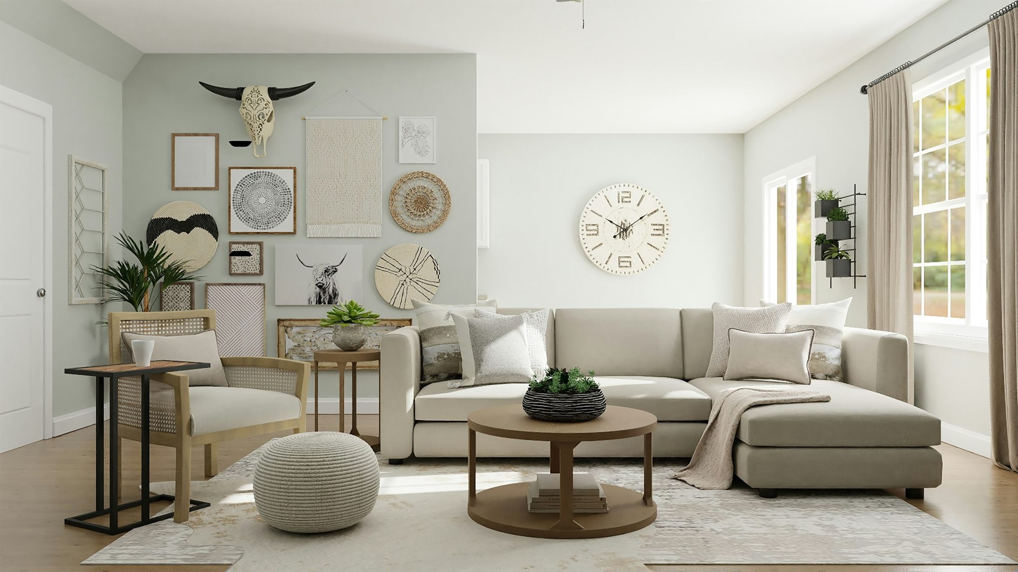 A repainted living room with a pale sage feature wall and a cream sectional